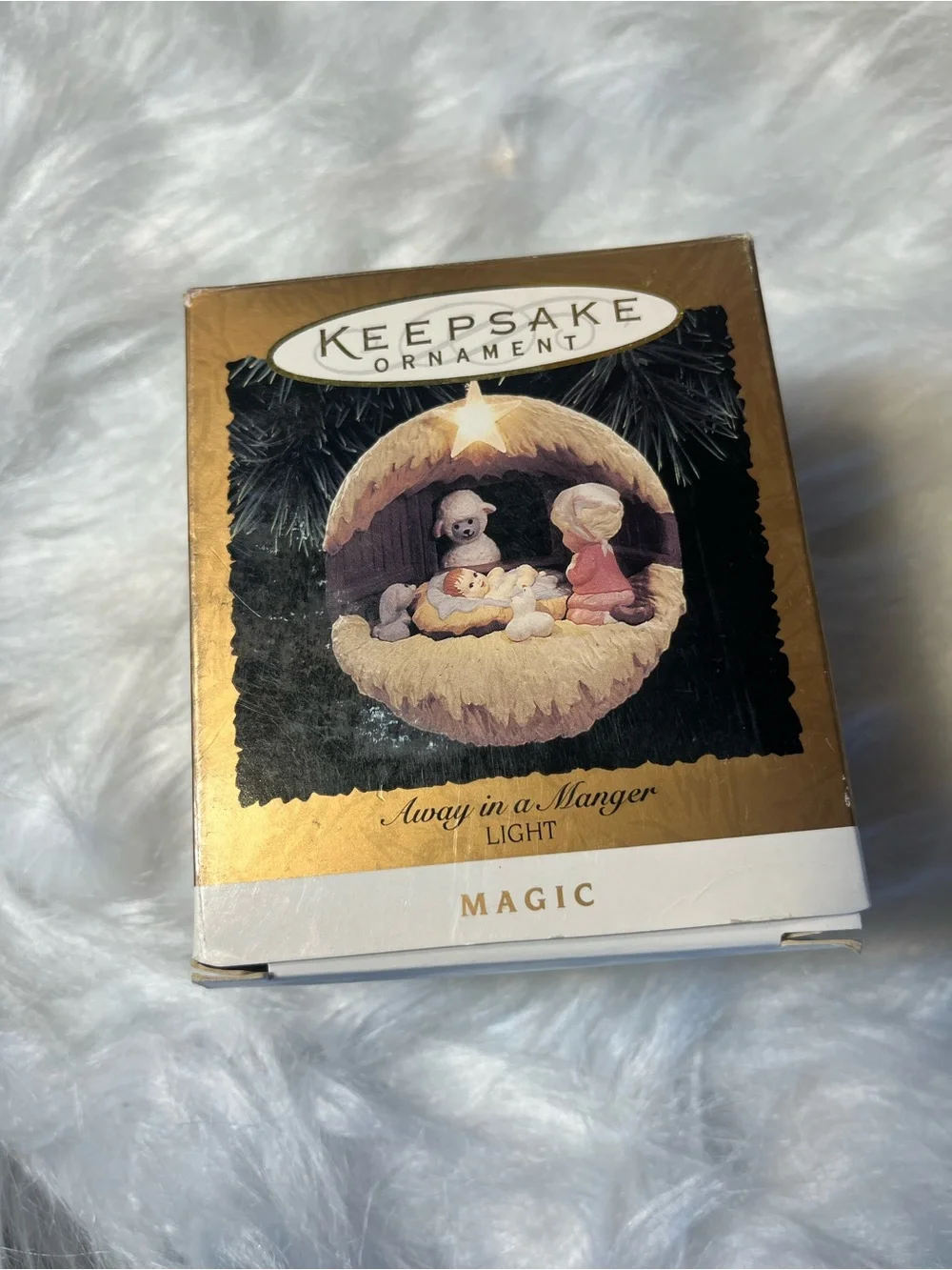 Hallmark 1994 Light and Motion Away in a Manger Ornament